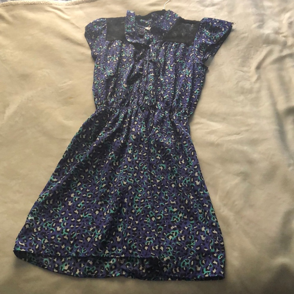 PURPLE DRESS WITH BLACK LACE COVERING SHOULDERS